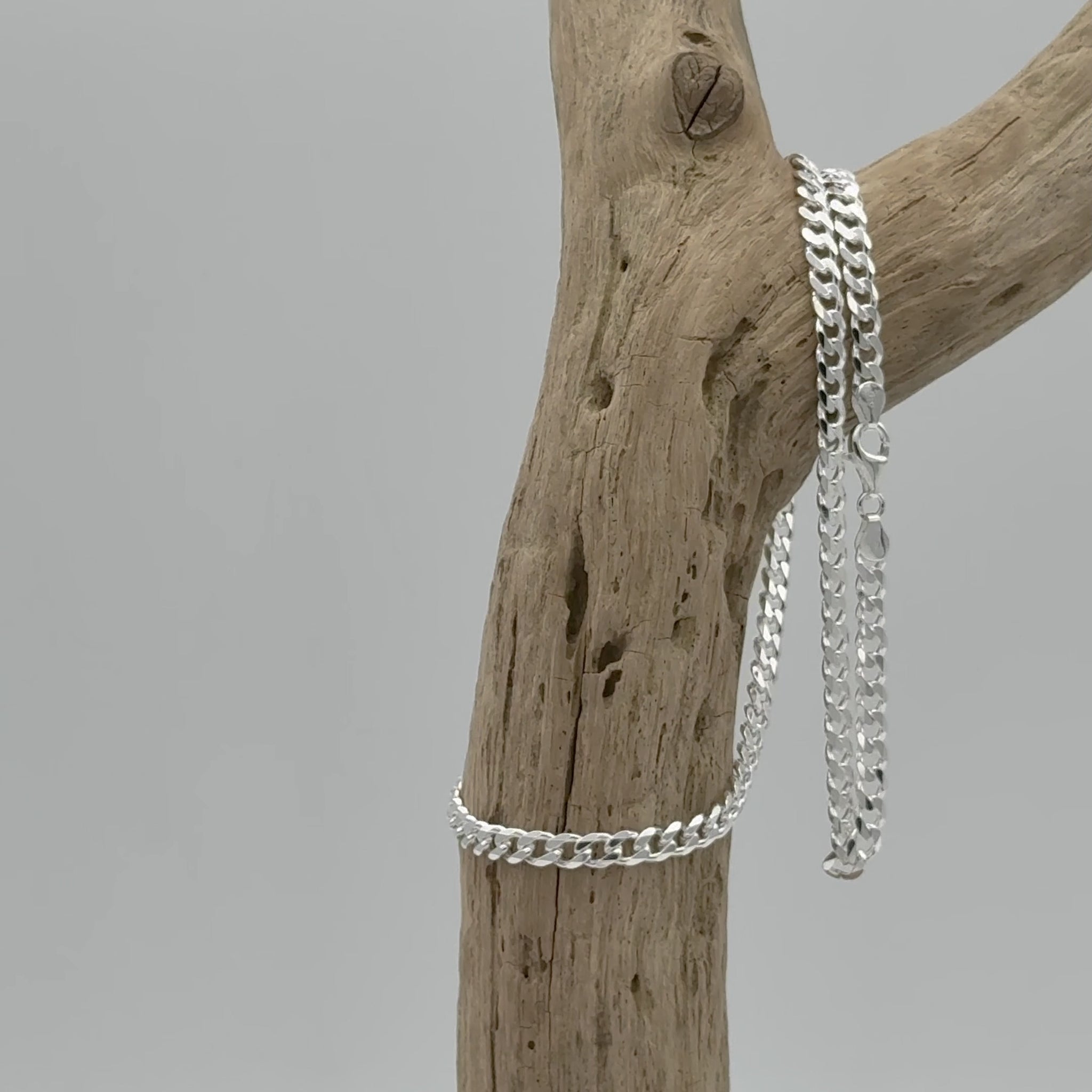 Platte zilveren gourmet ketting, 5,5 mm breed van 925 zilver. Platte schakel met subtiele glans en stijlvolle uitstraling voor elke dag.